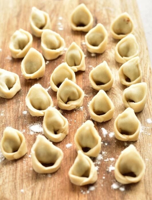 uszka (little dumplings) on a wooden board