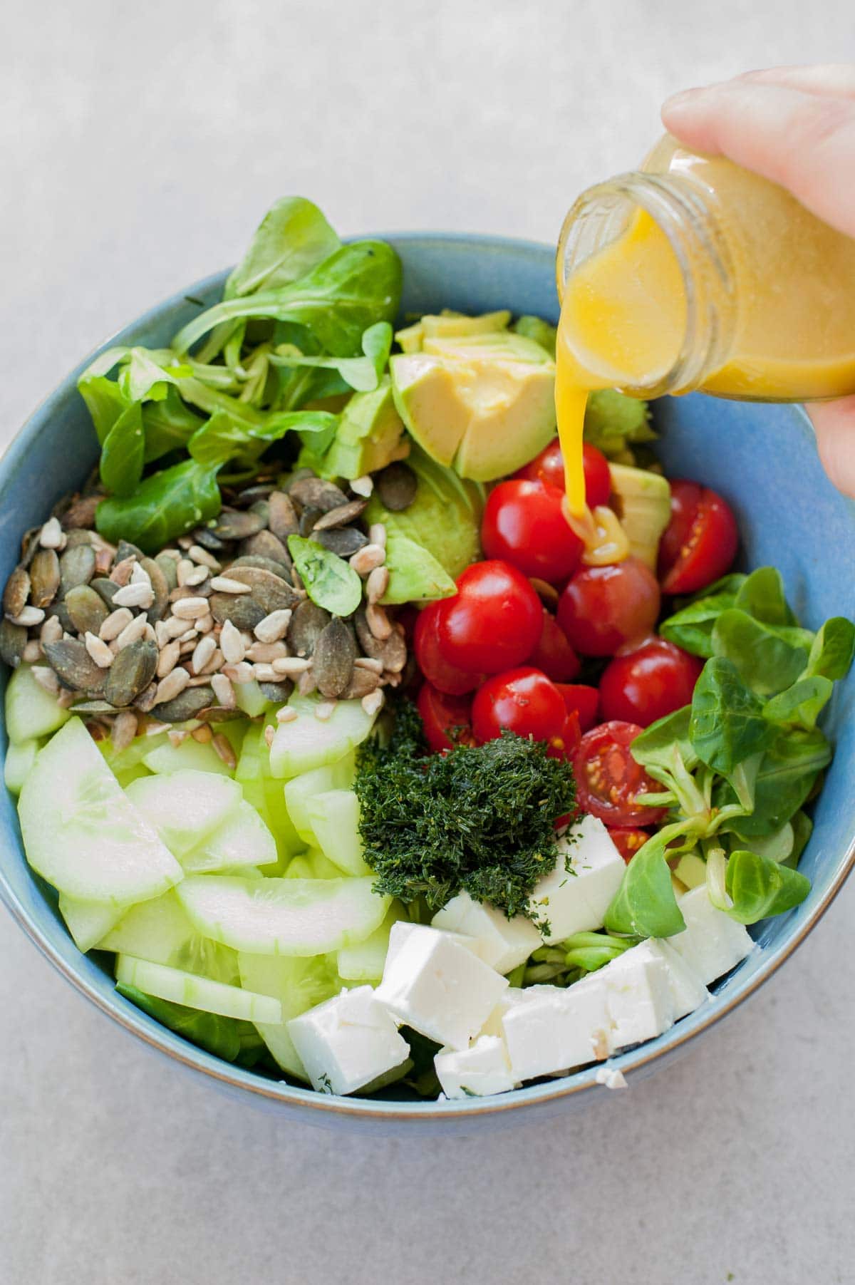 Cucumber avocado tomato salad with dill and feta - Everyday Delicious