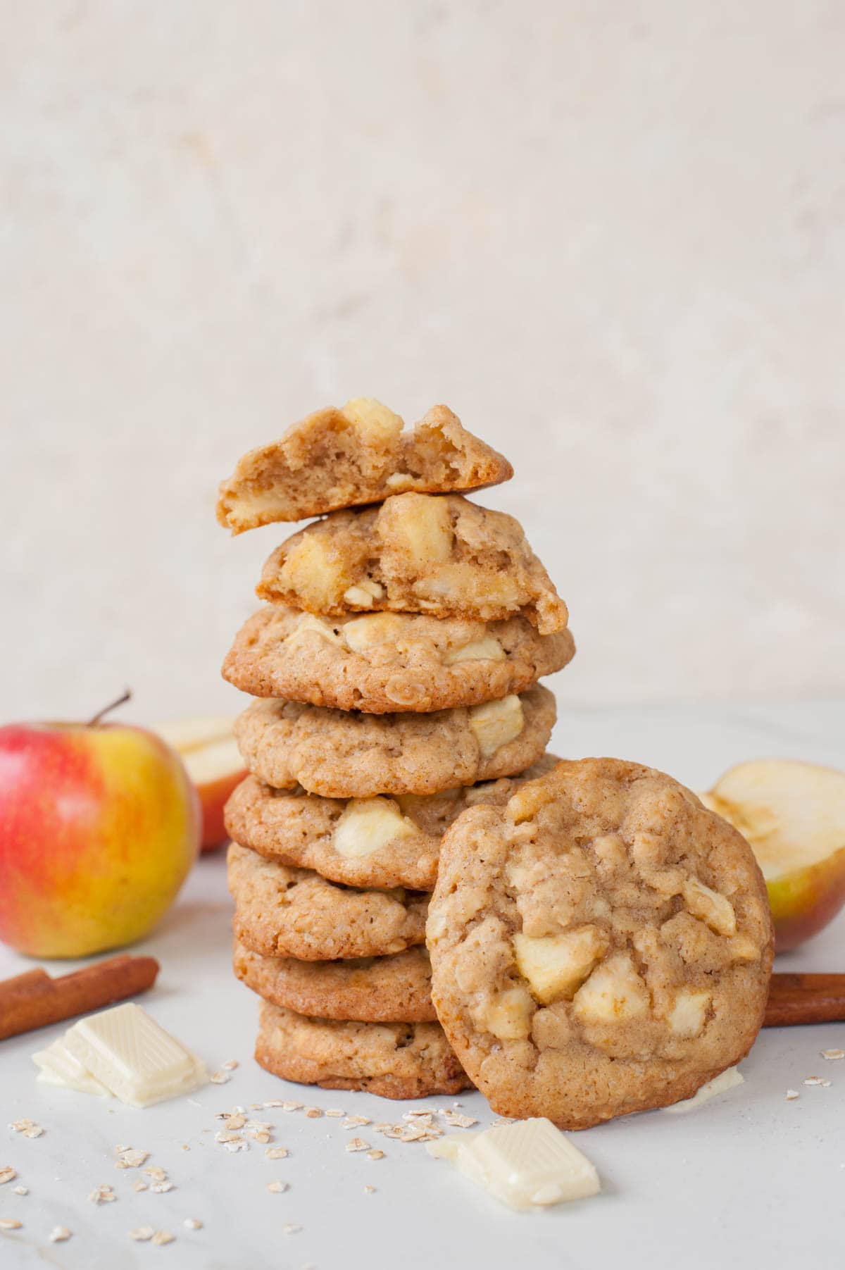 A stack of apple cinnamon oatmeal white chocolate chip cookies.