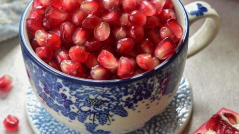 Can opener and pomegranate - open pomegranate for juice Stock Photo