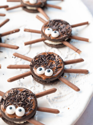 Oreo spiders on a white plate.