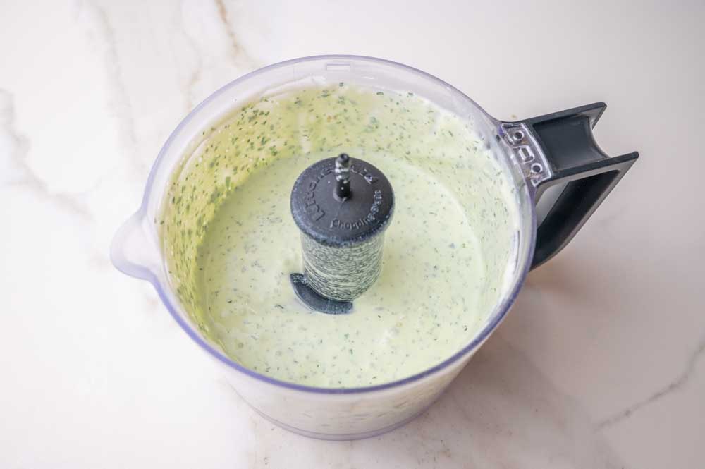 Cilantro Lime Crema in a food processor bowl.