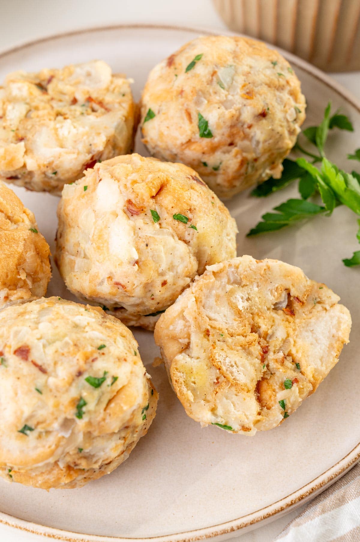 Semmelknödel on a beige plate.