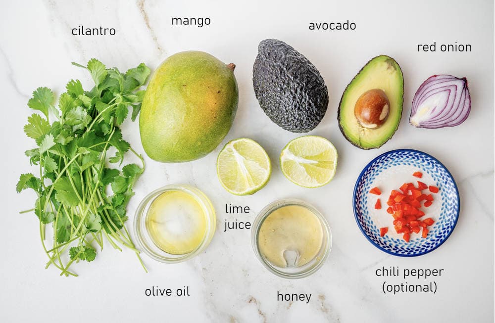 Labeled ingredients for mango avocado salsa.