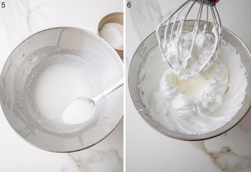 Foamy egg whites in a bowl. Whipped egg whites in a metal bowl.