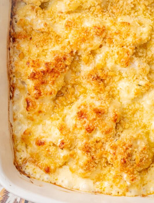 Cauliflower gratin in a white casserole dish.