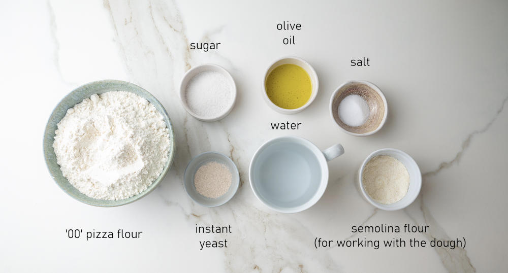 Labeled ingredients for pizza dough.