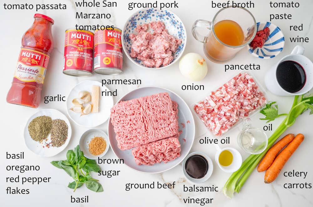 Labeled ingredients for spaghetti meat sauce.